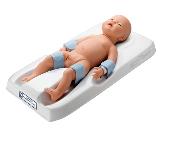 Infant positioned for a circumcision
