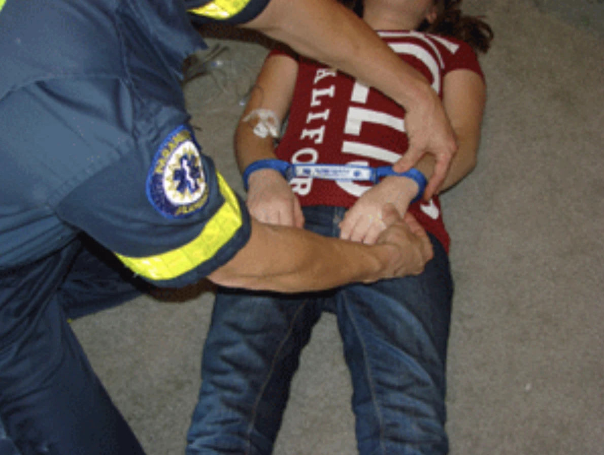 save a Jake code cuffs being applied to a patient.