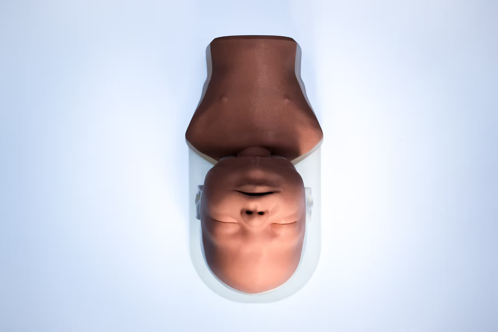 Light Skin (Hand-Painted) newborn airway management task trainer with replaceable modular components for neonatal intubation, BVM, and NRP training