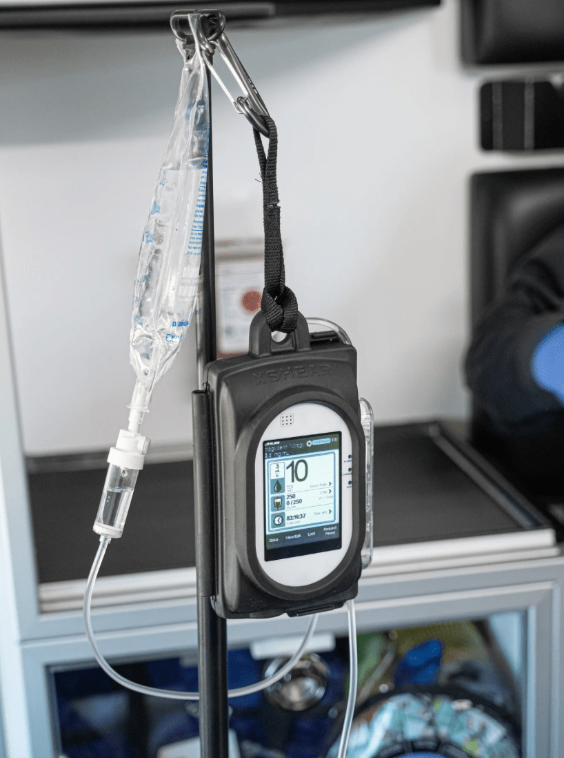 XSHEAR Sapphire Hanging IV Pump Case on a Stryker Stretcher IV Pole.