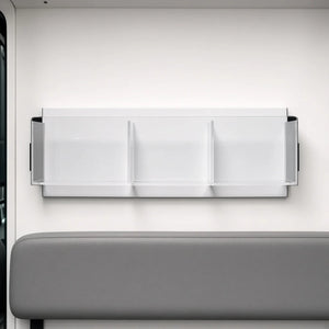 Pacific Biomedical compact acrylic ambulance organizer, 16.75 inches, three clear compartments mounted on an ambulance wall above a bench seat - Pacific Biomedical